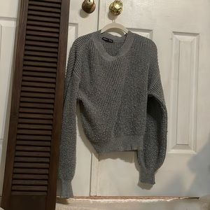 Woman’s SHEIN Sweater
